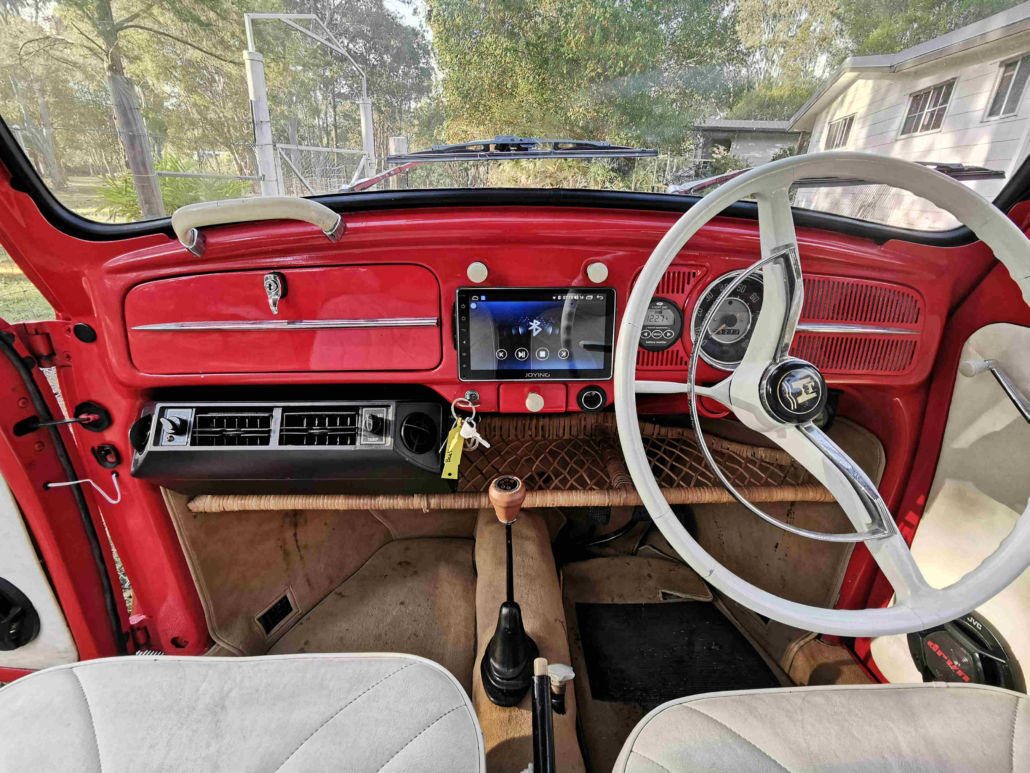 The 1964 electric Beetle with its aircon unit under the dash.