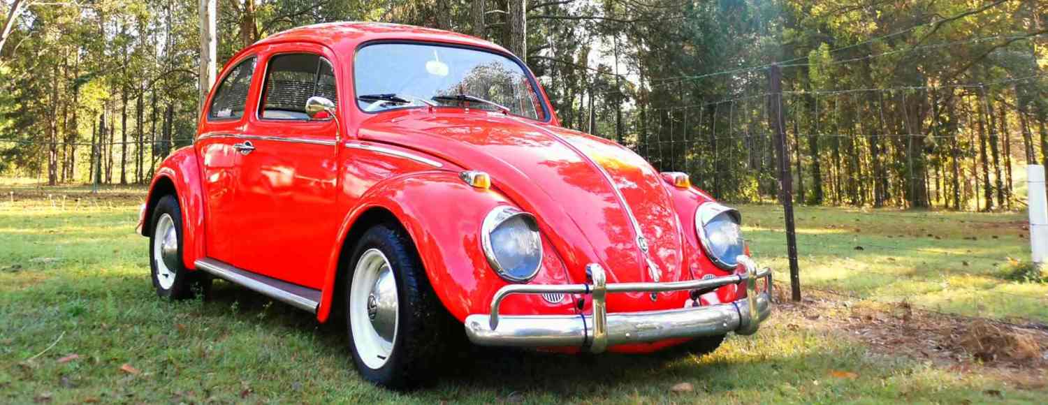 The shiny red electric 1964 VW Beetle